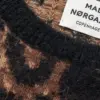 Detalje af leopardmønster og ribkanter på Garzati Madison Sweater.
