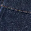 Detalje: fast linning og sidelomme på Cosy Denim Stelly Skirt Dark Indigo.