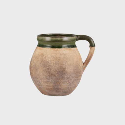CopilotHer er en kort og præcis meta-beskrivelse til produktet: Keramikvase med hank og grøn kant fra Ib Laursen. Del af Avignon-serien – dekorativ og perfekt til blomster.