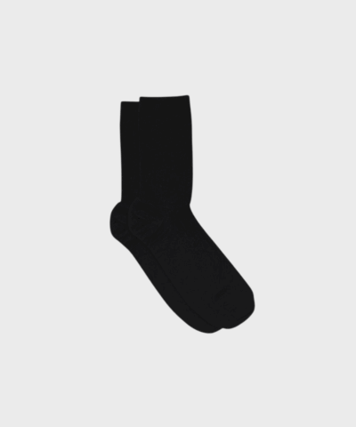 Ribstrikkede uldstrømper i sort fra MP Denmark. Superwash merinould, OEKO-TEX certificeret. Fri fragt over 499 DKK og levering på 1–3 hverdage.
