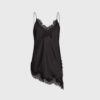 Naomi Asym Lingerie Top i Black eller Mocca er en elegant top med asymmetrisk design i let polyester. Perfekt til festlige anledninger eller som layering-piece. Køb online hos Merci Give med hurtig levering og fri fragt over 499 DKK.