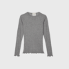 Opdag Mads Nørgaard Point Wool Poline Tee LS i Grey Melange – en luksuriøs langærmet T-shirt i 100% merinould. Perfekt til lag-på-lag styling og et tidløst, minimalistisk look. Shop den hos [din webshop] med hurtig levering og fri fragt over 499 DKK.