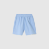 American Vintage Feoly Shorts i lyseblå Azurin er feminine sommer‑shorts i 100% bomuld, med høj elastisk talje, A‑line snit og smuk blondekant. Perfekt til lette sommerlooks. Find dem hos Merci Give.