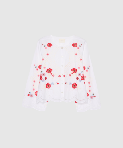 Vitus Shirt i White er en smuk skjorte i 100% økologisk bomuld med cutwork-detaljer, blomsterbroderi og en bølget kant. En elegant og moderne skjorte med relaxed fit og brede ærmer. Perfekt til både hverdag og særlige anledninger. Find den hos Merci Give.