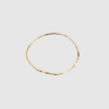 Organic Arena Bangle fra ENAMEL Copenhagen er et elegant armbånd i 18 kt forgyldt sterlingsølv med organisk, hamret overflade. Et let og tidløst smykke, perfekt alene eller i kombination med flere armbånd. Find Organic Arena Bangle hos Merci Give.