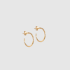 Organic Arena Small Hoops fra ENAMEL Copenhagen er små, elegante hoops i 18 kt forgyldt sterlingsølv med organisk, hamret overflade. Et tidløst og diskret smykke, perfekt til hverdagsbrug og minimalistisk styling. Find Organic Arena Hoops hos Merci Give.