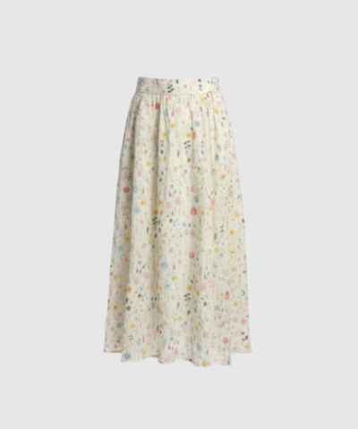 Paula Skirt i off white er en tidløs nederdel i bomulds‑ og polyesterblanding. En let og alsidig nederdel med elegant fald, perfekt til hverdagsbrug og sæsonens outfits. Find Paula Skirt hos Merci Give.