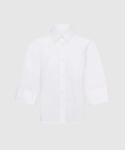 BotillaPW Skjorte fra Part Two er en boxy fit skjorte i 100 % økologisk bomuld. En moderne og komfortabel skjorte med korte ærmer og vævet kvalitet, perfekt til hverdagsbrug. Find BotillaPW Skjorten hos Merci Give.