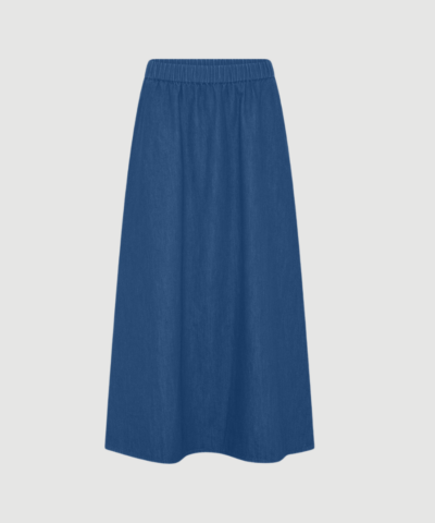 Melbourne Ankellang Denim Nederdel fra FRAU i farven Clear Blue Denim er en tidløs og enkel denimnederdel i 100 % økologisk bomuld. Nederdelen har elastisk talje, justerbar snøre og ankellang pasform, der giver et afslappet og brugbart look til både hverdag og fritid. Find FRAU Melbourne denim nederdel hos Merci Give.