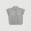 Dinnie NS Mini Check Shirt i off‑white og beige er en ærmeløs skjorte med afslappet pasform og klassiske tern. En stilren og let top, perfekt til sommer og lag‑på‑lag styling.
