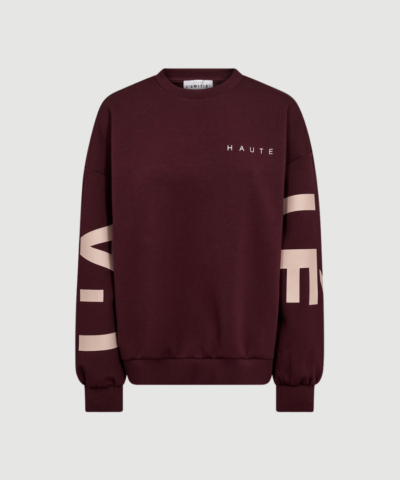 Maxi Split Logo Sweat i Wine er en afslappet sweatshirt med grafisk logo og blød kvalitet. En moderne og komfortabel style, perfekt til hverdagsbrug og casual outfits.