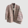 Tyler Sequins Jacket fra SISSEL EDELBO Vintage Kantha Pearl No. 47 er en unik jakke i upcyclet bomuld med håndsyede pailletter. En bæredygtig statement‑jakke med løs pasform.